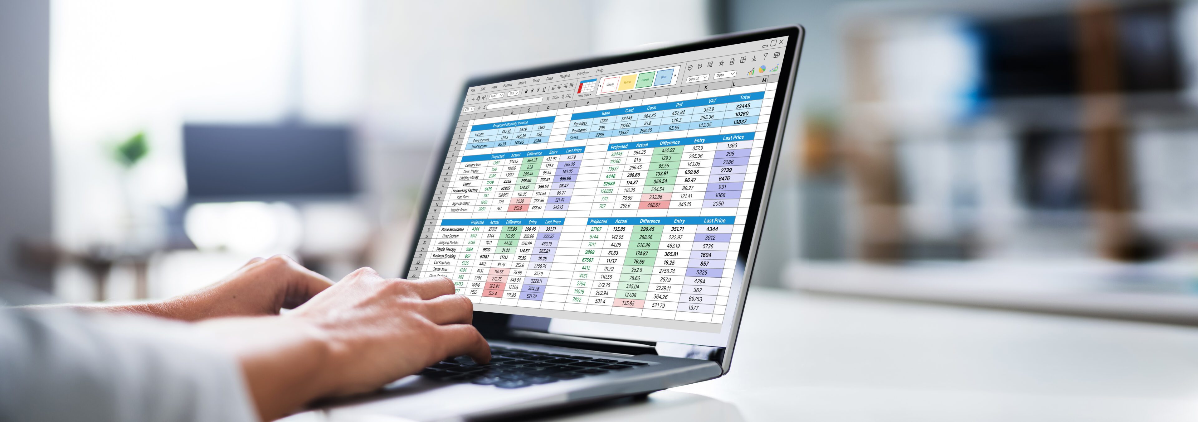 Close-up Of A Businesswoman's Hand Analyzing Graph On Laptop